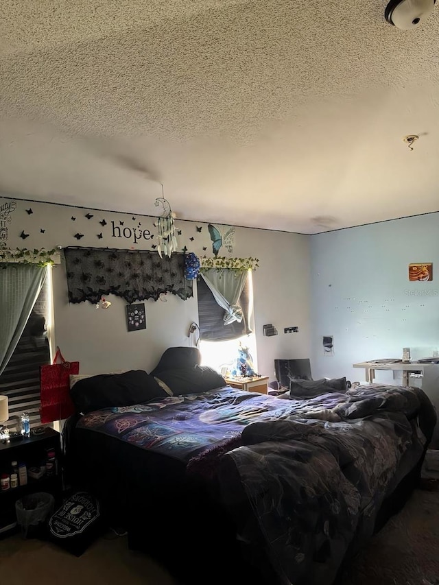 bedroom with a textured ceiling