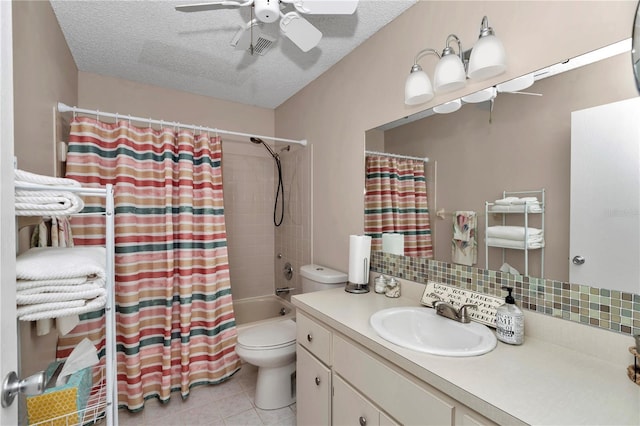 8787 SW 90th Ln Unit E, Ocala, FL 34481 - bathroom featuring tile patterned floors, tasteful backsplash, a textured ceiling, and a ceiling fan
