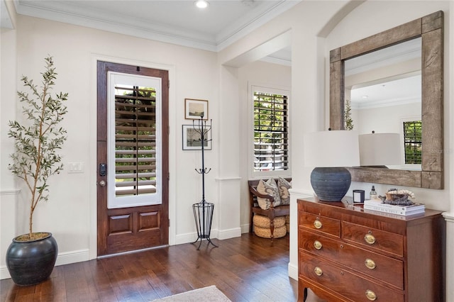 entrance foyer featuring recessed lighting, baseboards, dark wood finished floors, and crown molding