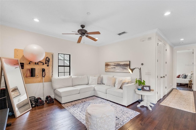 living room featuring a ceiling fan, dark wood-style floors, visible vents, recessed lighting, and crown molding