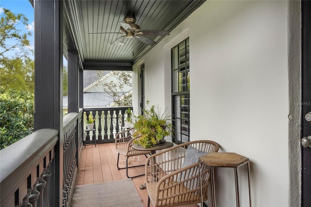 balcony featuring ceiling fan