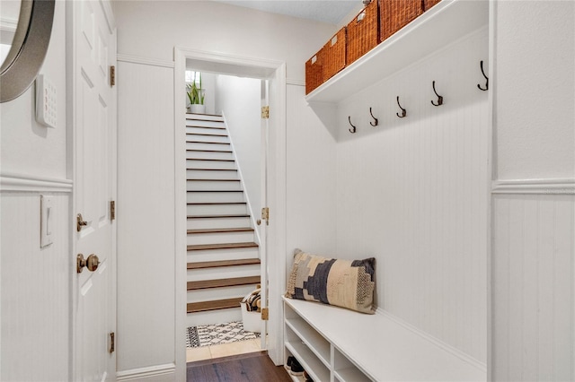 mudroom with dark wood-style flooring