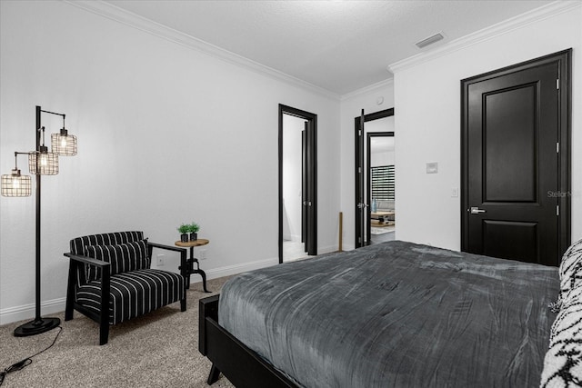 bedroom with visible vents, baseboards, crown molding, and carpet