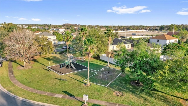 birds eye view of property with a residential view