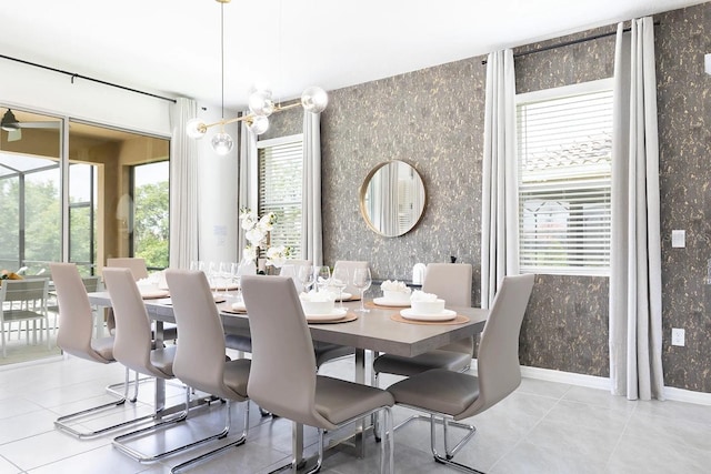 dining area with wallpapered walls and tile patterned floors