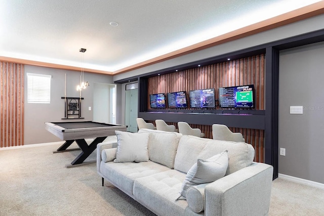 home theater room featuring billiards, carpet flooring, baseboards, and a raised ceiling