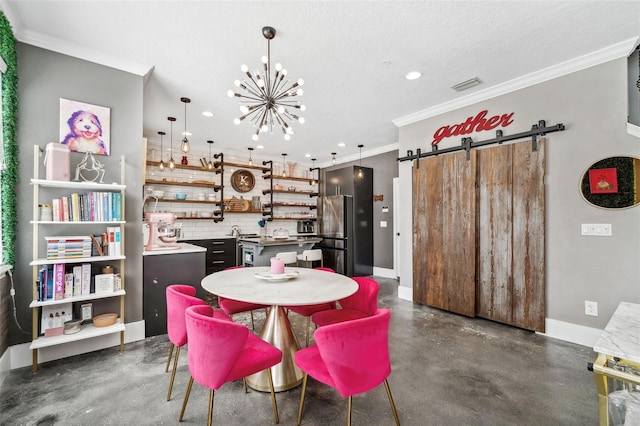 dining room featuring visible vents, ornamental molding, finished concrete flooring, a barn door, and a chandelier