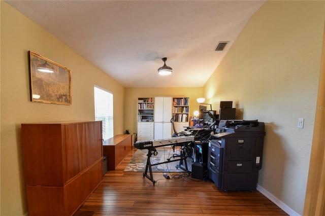 office area with visible vents, wood-type flooring, and baseboards