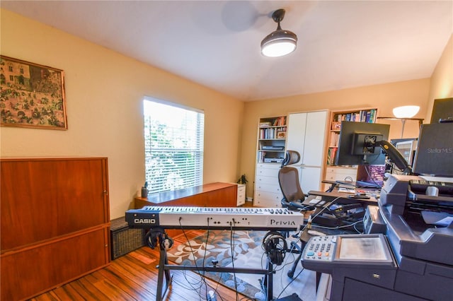 home office featuring wood finished floors