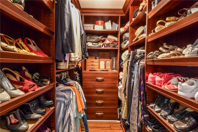 spacious closet with wood finished floors