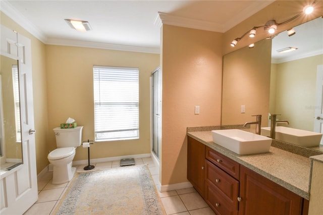 bathroom featuring vanity, toilet, and crown molding