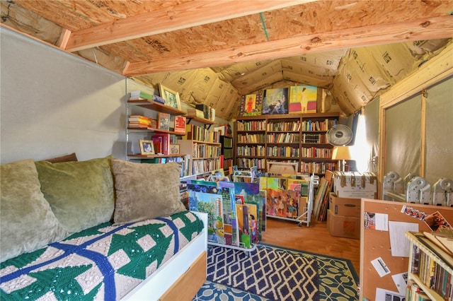 sitting room with lofted ceiling and wood finished floors