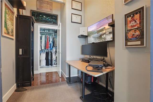 office area with baseboards and carpet