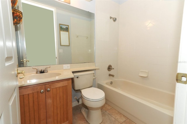 bathroom with tile patterned floors, toilet, bathtub / shower combination, and vanity