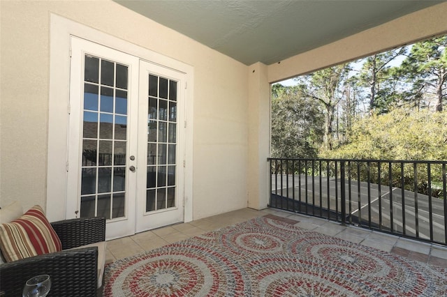 balcony featuring french doors