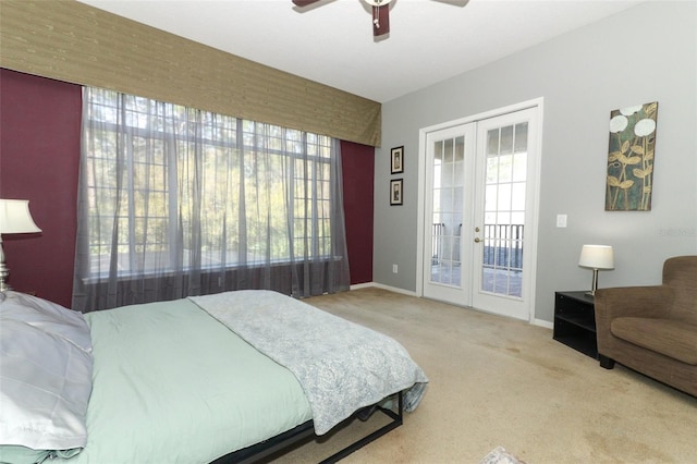 carpeted bedroom with french doors, baseboards, a ceiling fan, and access to outside