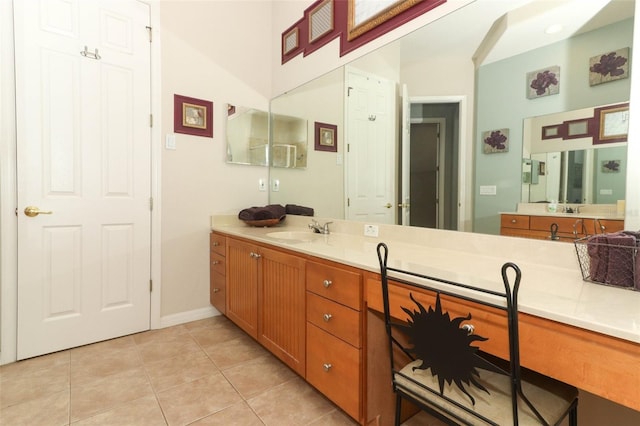 bathroom featuring vanity and tile patterned flooring