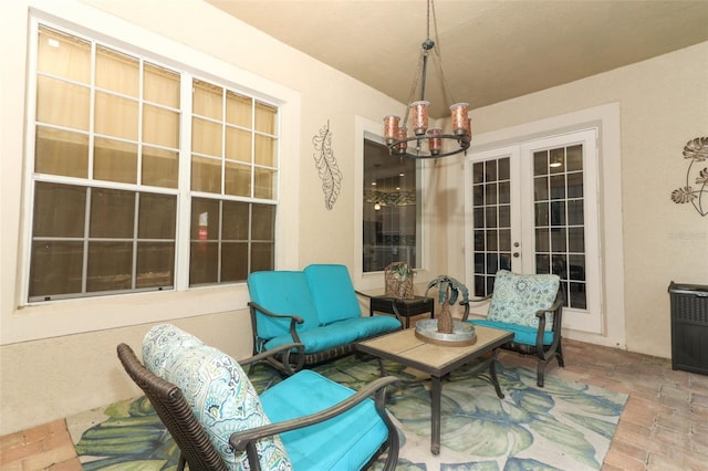 view of patio featuring an outdoor living space and french doors