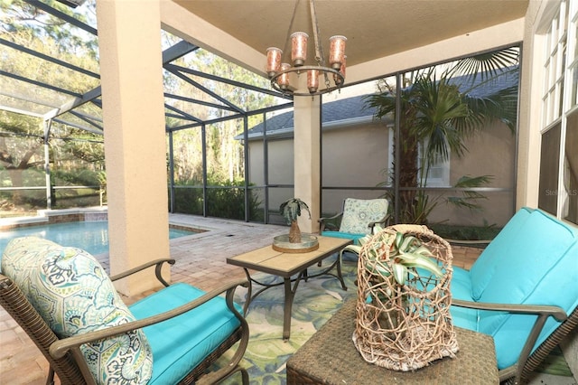 view of patio featuring glass enclosure, an outdoor pool, and an outdoor hangout area