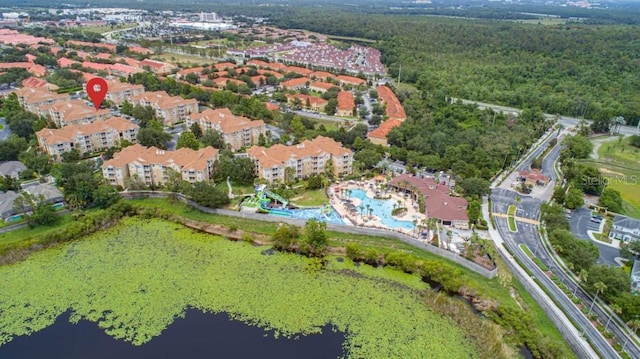 drone / aerial view with a water view