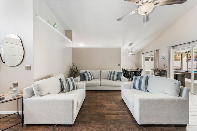 living room featuring lofted ceiling, ceiling fan, and wood finished floors