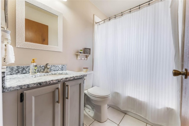 full bathroom with tile patterned floors, shower / bathtub combination with curtain, toilet, and vanity