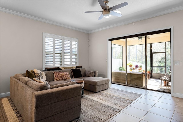 living room featuring crown molding, light tile patterned flooring, and a healthy amount of sunlight