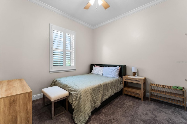 bedroom featuring ceiling fan, crown molding, baseboards, and dark colored carpet