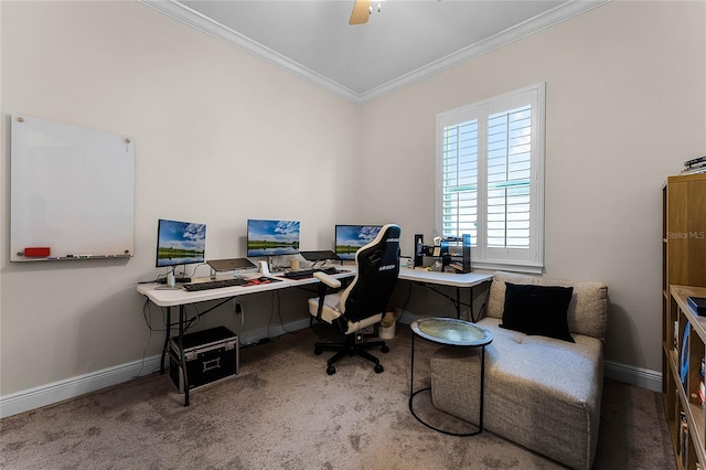 carpeted office with baseboards, ornamental molding, and a ceiling fan