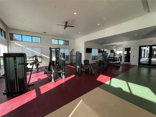 exercise room with recessed lighting and ceiling fan