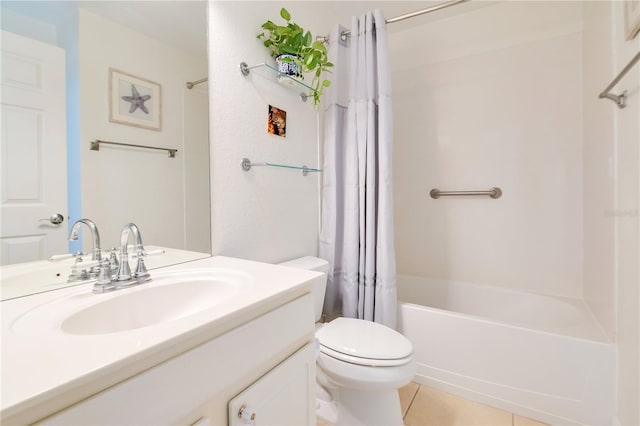 bathroom with tile patterned floors, toilet, vanity, and shower / bath combo