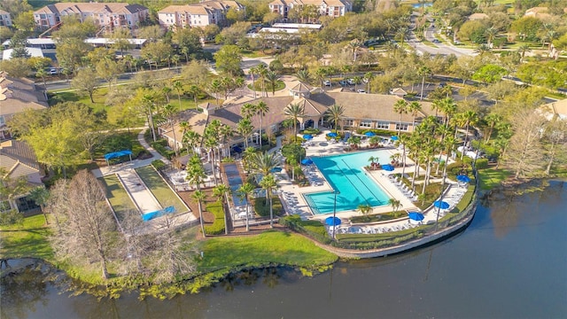 bird's eye view featuring a residential view and a water view