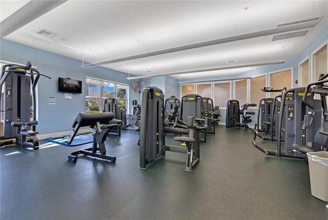 gym with visible vents and baseboards