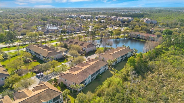 aerial view featuring a residential view and a water view