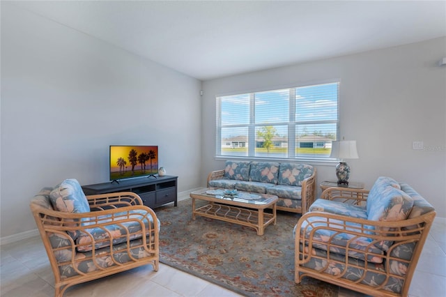 tiled living room with baseboards