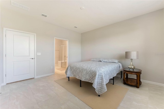 bedroom with visible vents and baseboards