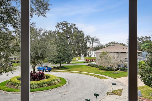 view of street featuring curbs and sidewalks