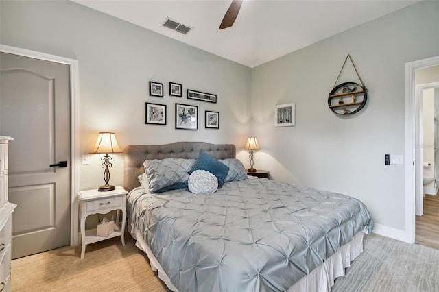 bedroom featuring visible vents, baseboards, carpet, and a ceiling fan