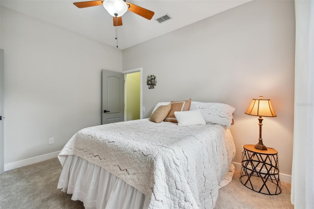 bedroom featuring ceiling fan, carpet, visible vents, and baseboards