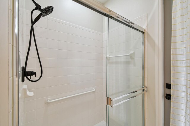 full bathroom with a stall shower