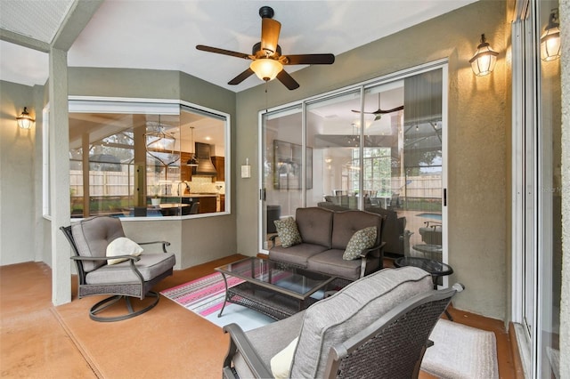 sunroom / solarium with ceiling fan