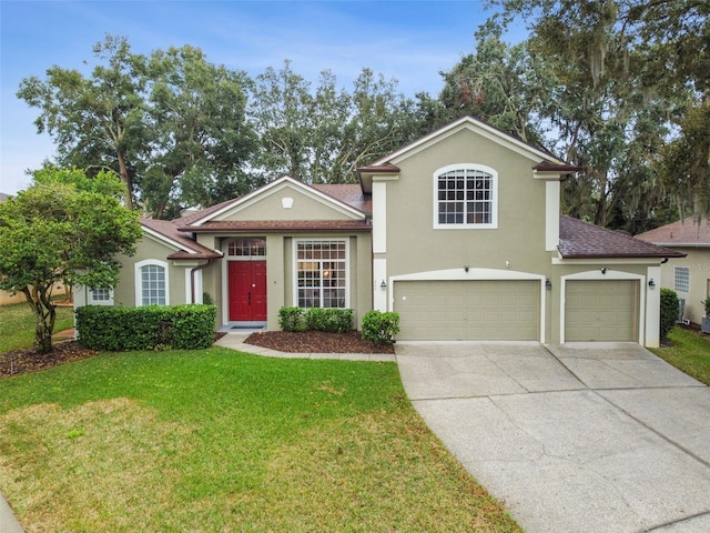 view of front of house featuring stucco siding, an attached garage, concrete driveway, and a front yard