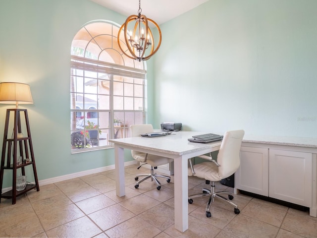 home office with baseboards and a chandelier