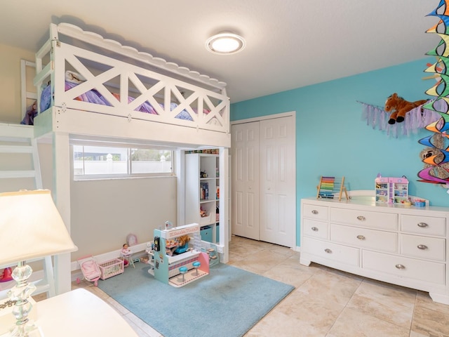 recreation room with light tile patterned floors