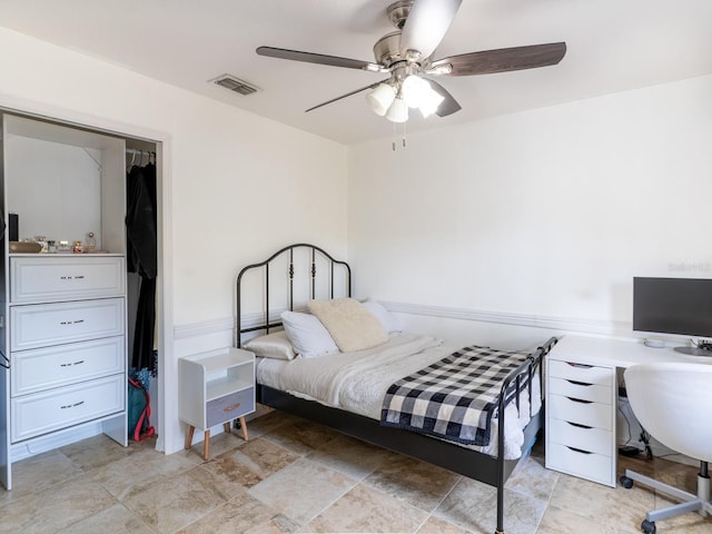 bedroom featuring visible vents and ceiling fan