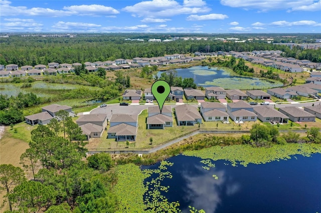 aerial view featuring a residential view and a water view