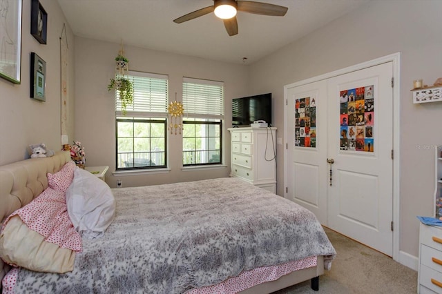 bedroom featuring a ceiling fan and carpet floors