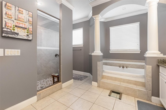 full bathroom with a bath, a walk in shower, ornate columns, and ornamental molding