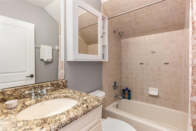 bathroom with lofted ceiling, toilet, vanity, and shower / tub combo