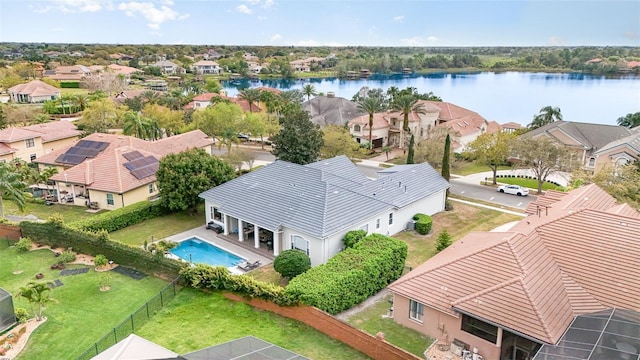 bird's eye view with a residential view and a water view